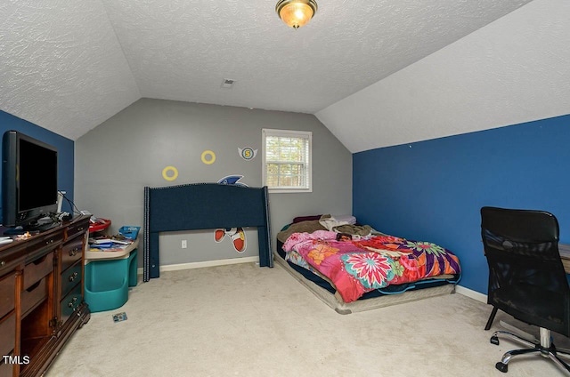 carpeted bedroom with lofted ceiling, baseboards, visible vents, and a textured ceiling
