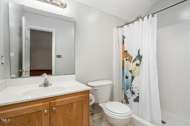 bathroom featuring toilet, a shower with curtain, and vanity