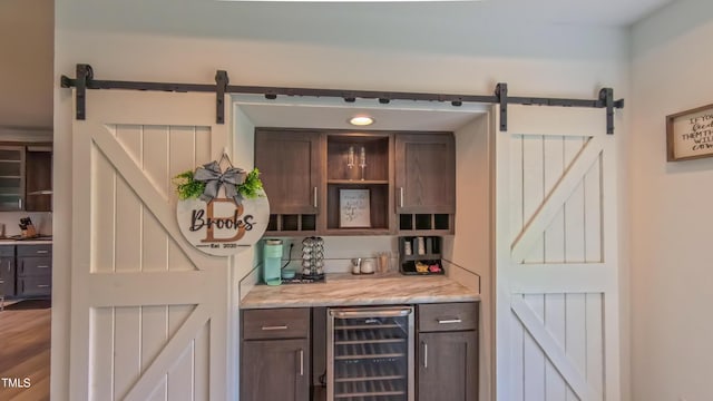 2912 Epps Clark Rd, Siler City, NC 27344 - indoor dry bar featuring a barn door and wine cooler