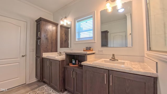2912 Epps Clark Rd, Siler City, NC 27344 - full bath with crown molding, two vanities, and wood finished floors