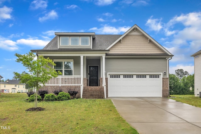 9 Little Sunshine Brk, Smithfield, NC 27577 - craftsman-style home featuring driveway, a garage, covered porch, brick siding, and a front yard