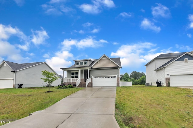 9 Little Sunshine Brk, Smithfield, NC 27577 - view of front of property featuring a porch, a front lawn, driveway, and brick siding