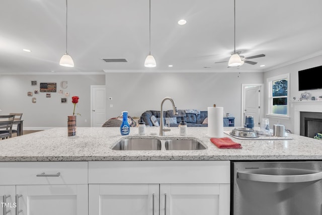 9 Little Sunshine Brk, Smithfield, NC 27577 - kitchen with dishwasher, open floor plan, a sink, ornamental molding, and white cabinetry
