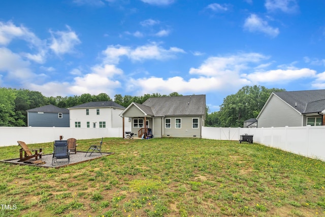 9 Little Sunshine Brk, Smithfield, NC 27577 - rear view of house featuring a patio area and a fire pit