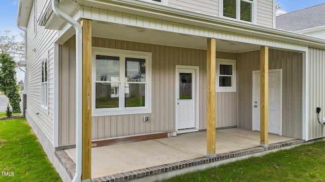 entrance to property featuring a patio