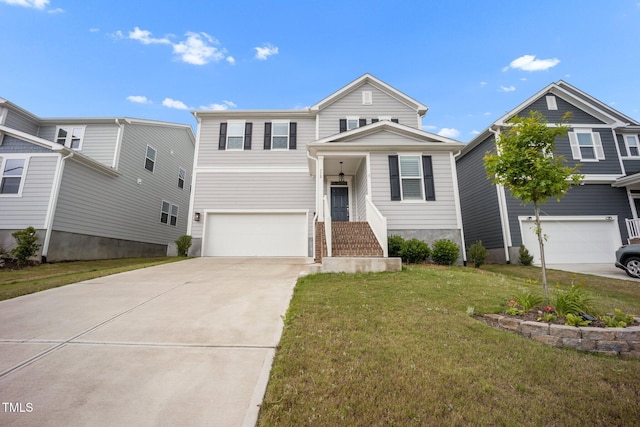 712 Emmer St, Rolesville, NC 27571 - view of front facade featuring an attached garage, driveway, and a front yard