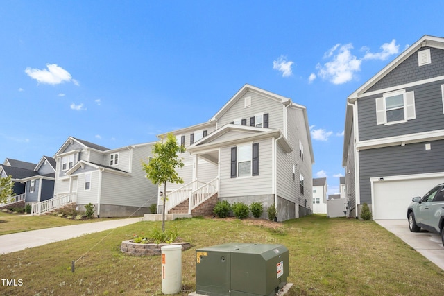 712 Emmer St, Rolesville, NC 27571 - view of front of house with driveway, a garage, and a front lawn
