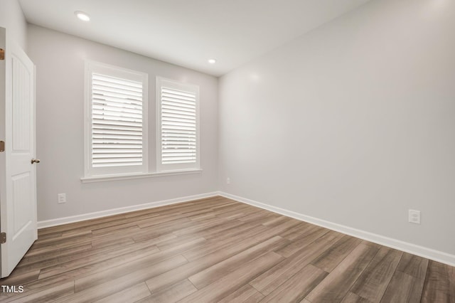 712 Emmer St, Rolesville, NC 27571 - unfurnished room featuring wood finished floors, baseboards, and recessed lighting