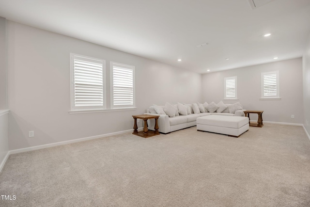 712 Emmer St, Rolesville, NC 27571 - carpeted living area featuring baseboards and recessed lighting