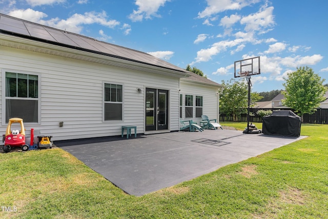 back of house with a patio