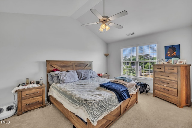 bedroom with light carpet, lofted ceiling, and a ceiling fan