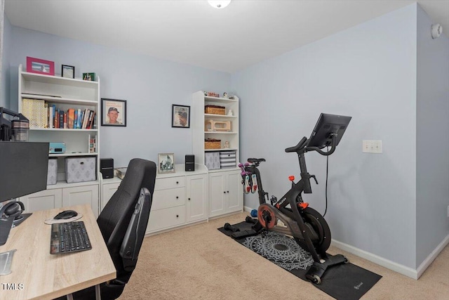 office featuring light colored carpet and baseboards