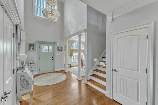 296 Shoreline Dr, Princeton, NC 27569 - foyer with stairs, a high ceiling, plenty of natural light, and wood finished floors