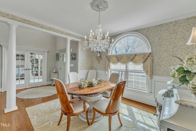 296 Shoreline Dr, Princeton, NC 27569 - dining room featuring wallpapered walls, wood finished floors, and wainscoting