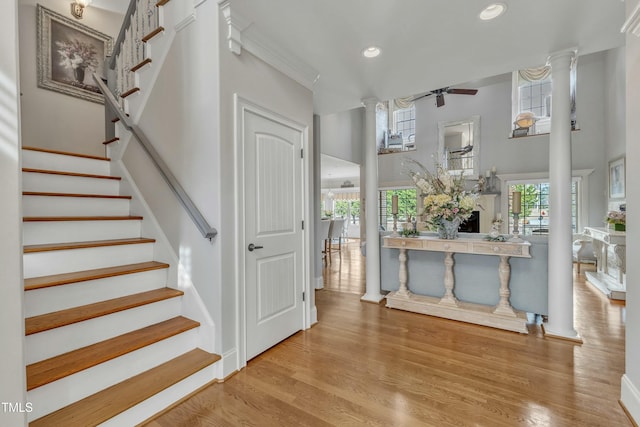 296 Shoreline Dr, Princeton, NC 27569 - stairs with a ceiling fan, a high ceiling, recessed lighting, and ornate columns