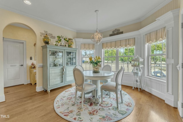 296 Shoreline Dr, Princeton, NC 27569 - dining area with ornamental molding, recessed lighting, a chandelier, light wood-style flooring, and arched walkways