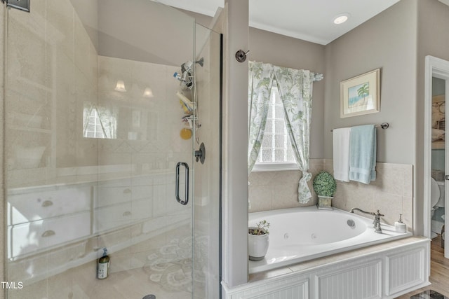 296 Shoreline Dr, Princeton, NC 27569 - bathroom featuring a shower stall and a tub with jets