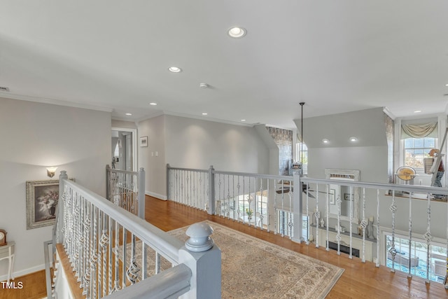 296 Shoreline Dr, Princeton, NC 27569 - corridor with recessed lighting, baseboards, crown molding, wood finished floors, and an upstairs landing