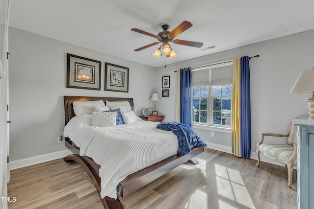 296 Shoreline Dr, Princeton, NC 27569 - bedroom featuring a ceiling fan, baseboards, light wood-type flooring, and visible vents