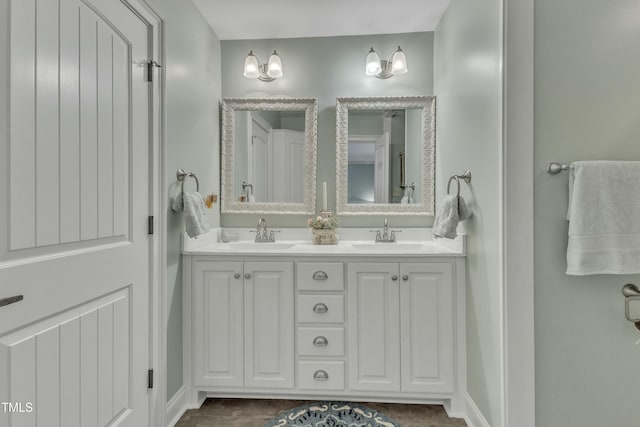 296 Shoreline Dr, Princeton, NC 27569 - full bathroom featuring double vanity, baseboards, and a sink