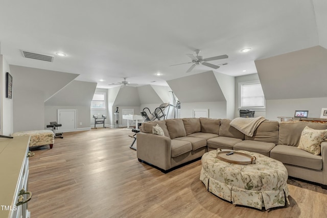 296 Shoreline Dr, Princeton, NC 27569 - living area featuring a ceiling fan, lofted ceiling, light wood-style flooring, a healthy amount of sunlight, and visible vents