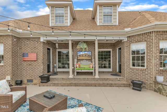 296 Shoreline Dr, Princeton, NC 27569 - rear view of property featuring a patio area, brick siding, a shingled roof, and outdoor lounge area