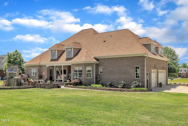 296 Shoreline Dr, Princeton, NC 27569 - back of house with a yard, concrete driveway, brick siding, and a garage