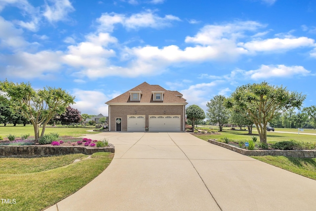 296 Shoreline Dr, Princeton, NC 27569 - view of front of home featuring driveway, brick siding, a front lawn, and an attached garage
