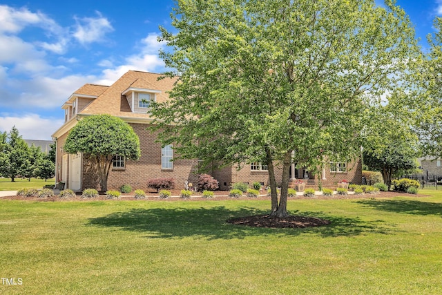 296 Shoreline Dr, Princeton, NC 27569 - view of front facade featuring brick siding and a front yard