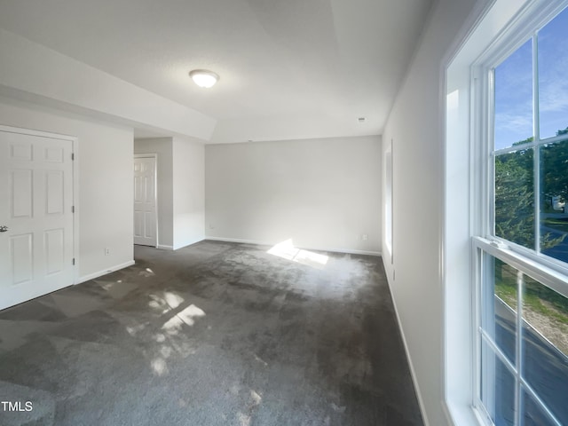 4126 Amber Stone Way, Durham, NC 27704 - interior space with baseboards and dark carpet