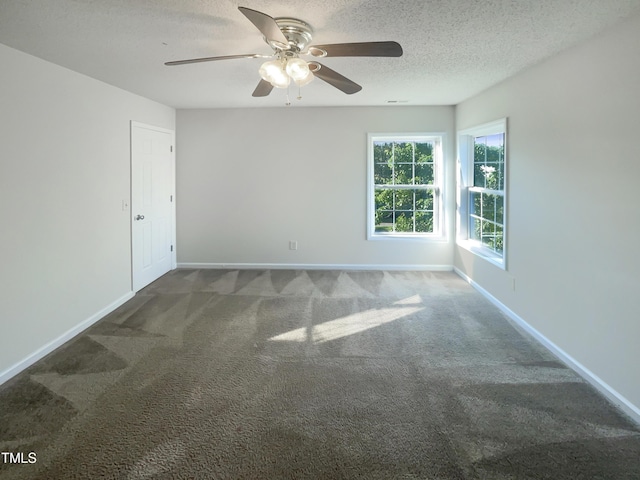 4126 Amber Stone Way, Durham, NC 27704 - unfurnished room with a textured ceiling, carpet flooring, baseboards, and a ceiling fan