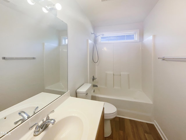 4126 Amber Stone Way, Durham, NC 27704 - bathroom featuring toilet, vanity, bathtub / shower combination, and wood finished floors
