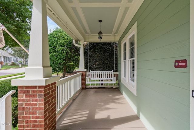 view of patio featuring a porch