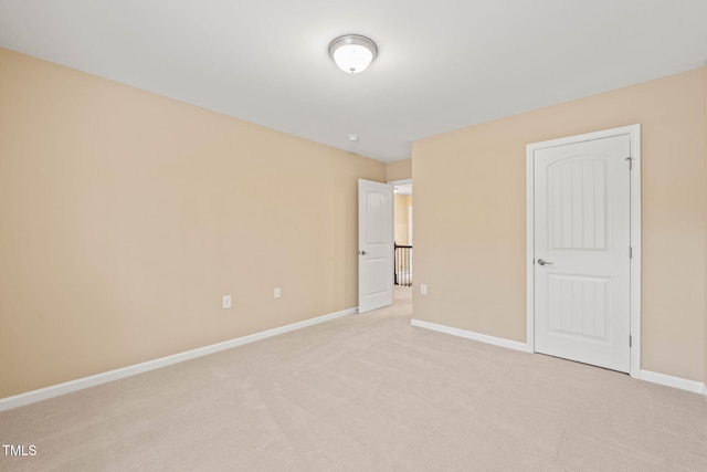 507 Brier Crossings Loop, Durham, NC 27703 - unfurnished bedroom featuring light colored carpet and baseboards