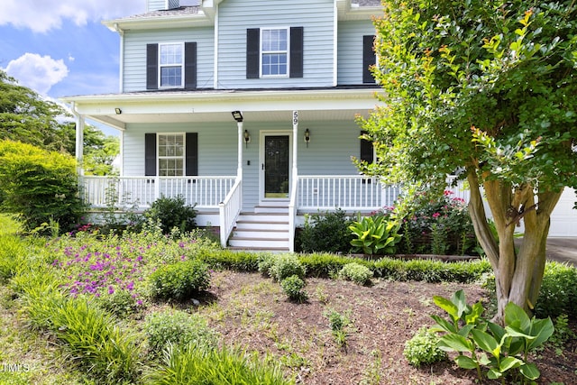 59 Troy Dr, Fuquay Varina, NC 27526 - view of front of property featuring covered porch and a chimney