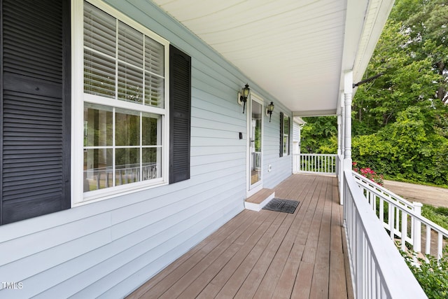 59 Troy Dr, Fuquay Varina, NC 27526 - wooden deck featuring covered porch