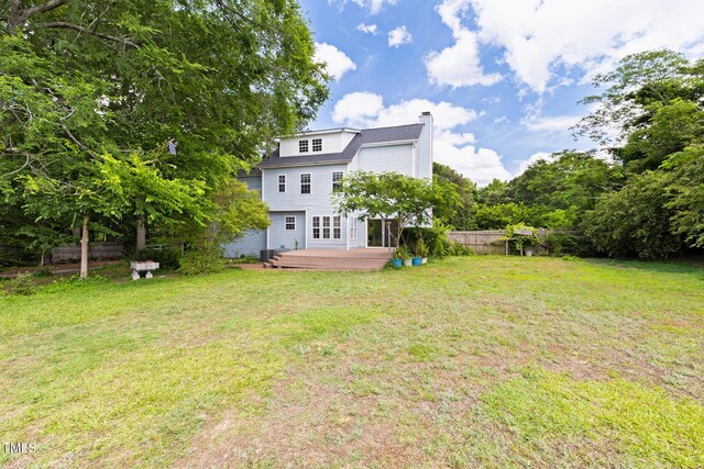 59 Troy Dr, Fuquay Varina, NC 27526 - back of property featuring a chimney and a deck