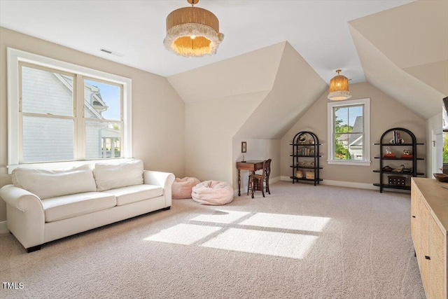 additional living space with carpet floors, vaulted ceiling, and baseboards