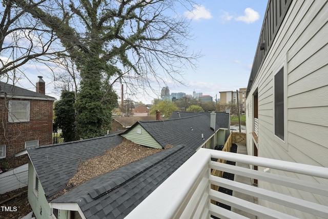 view of side of property featuring a balcony