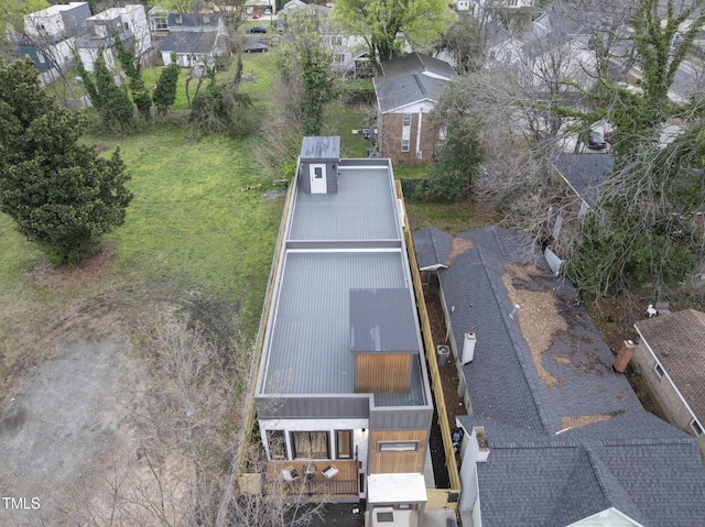 aerial overview of property's location with nearby suburban area