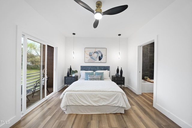 bedroom with access to exterior, wood finished floors, baseboards, and ceiling fan