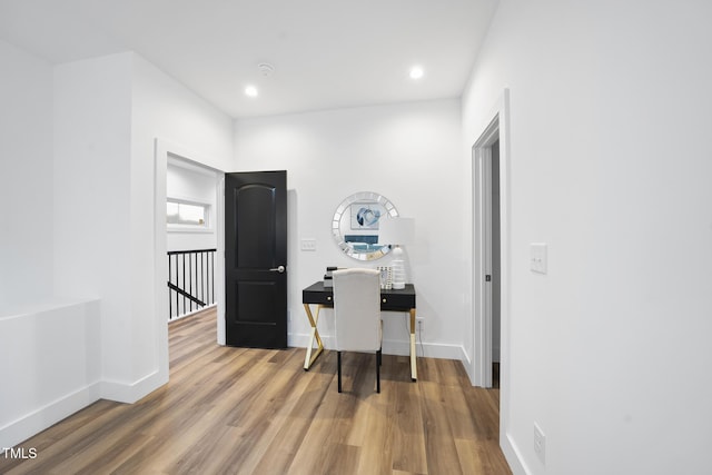 office space featuring wood finished floors, baseboards, and recessed lighting