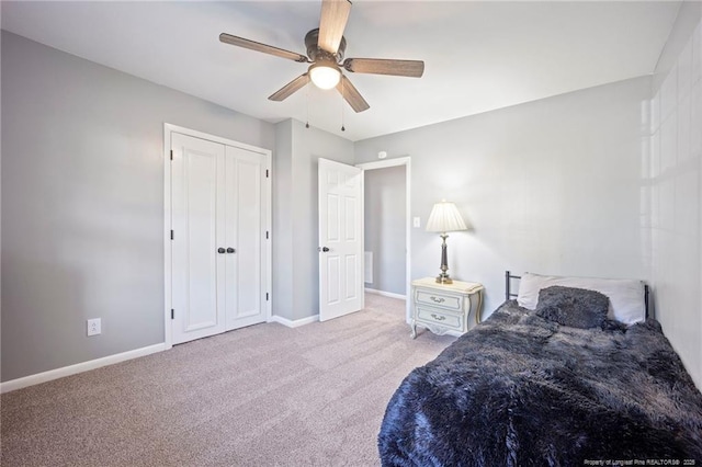 bedroom with carpet flooring, baseboards, and ceiling fan
