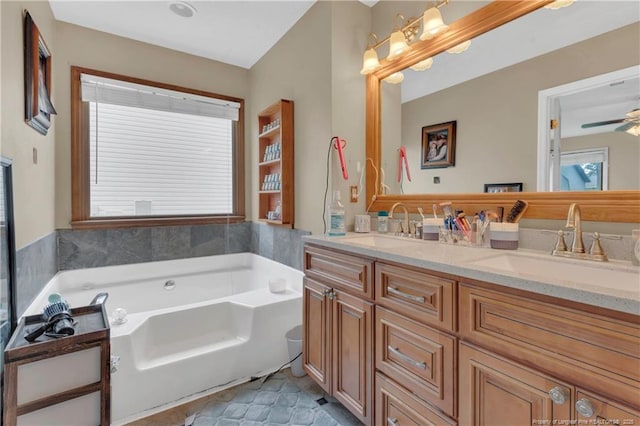 full bathroom featuring a garden tub, double vanity, and a sink