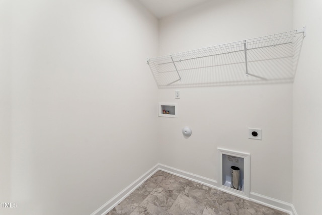 clothes washing area with washer hookup, electric dryer hookup, baseboards, and gas dryer hookup