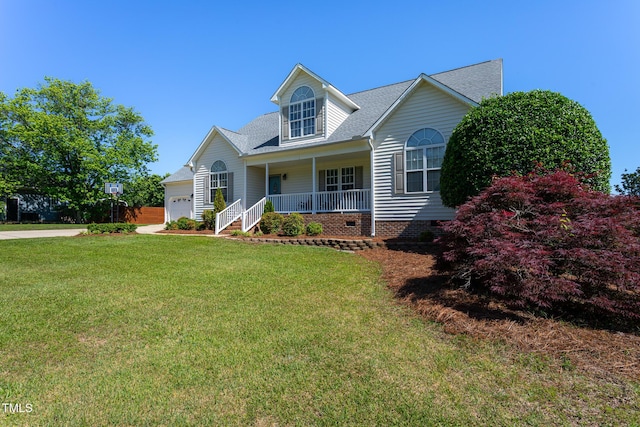 view of front of property with covered porch, crawl space, a garage, a front lawn, and roof with shingles