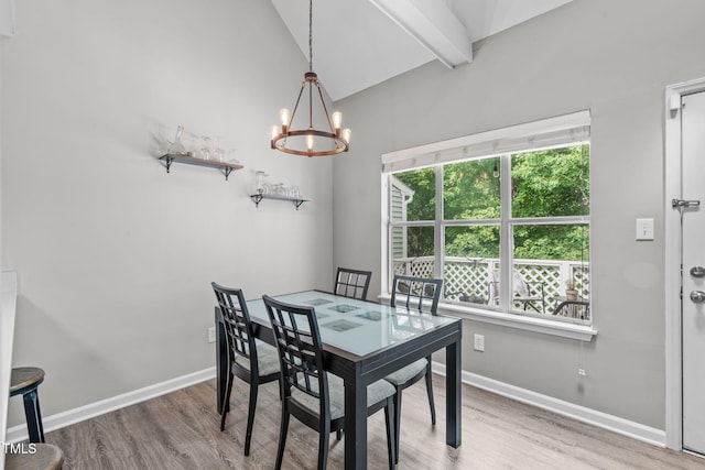 405 Gooseneck Dr Unit B6, Cary, NC 27513 - dining area with wood finished floors, a chandelier, lofted ceiling, and baseboards