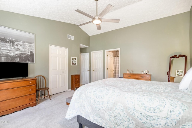 carpeted bedroom featuring ceiling fan, high vaulted ceiling, and a textured ceiling