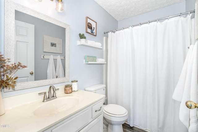 full bathroom with toilet, vanity, a textured ceiling, and a shower with shower curtain