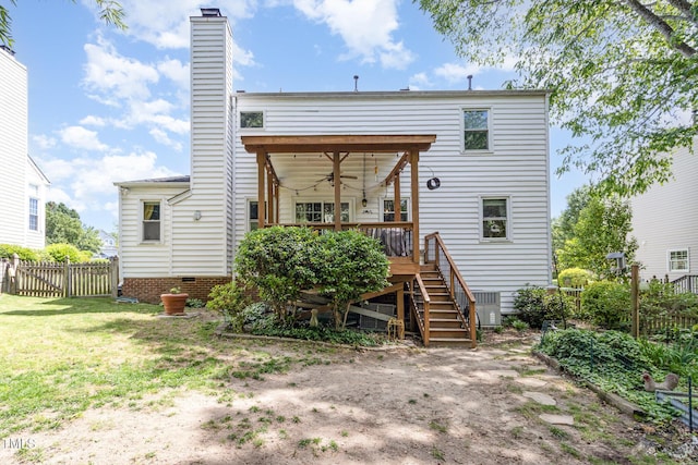 back of house featuring ceiling fan, stairs, a chimney, a deck, and crawl space
